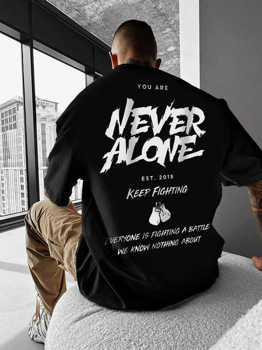 Black oversized cotton tshirt with never alone print